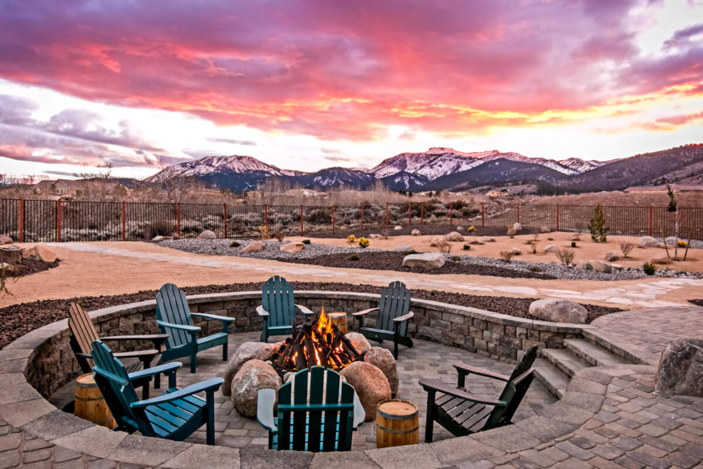 outdoor firepit with pink sky